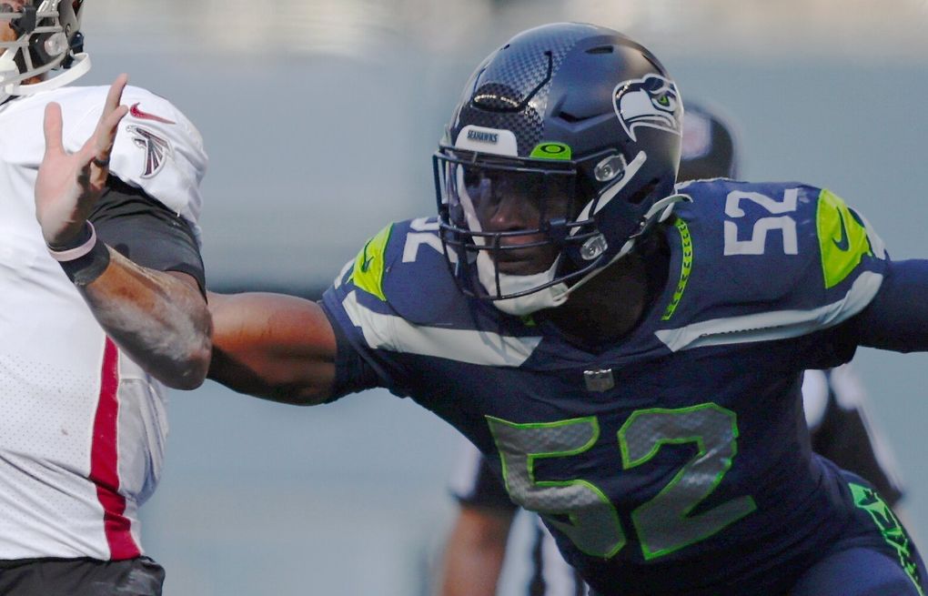 October 16, 2022: Seattle Seahawks linebacker Darrell Taylor (52)  celebrates with Seattle Seahawks s