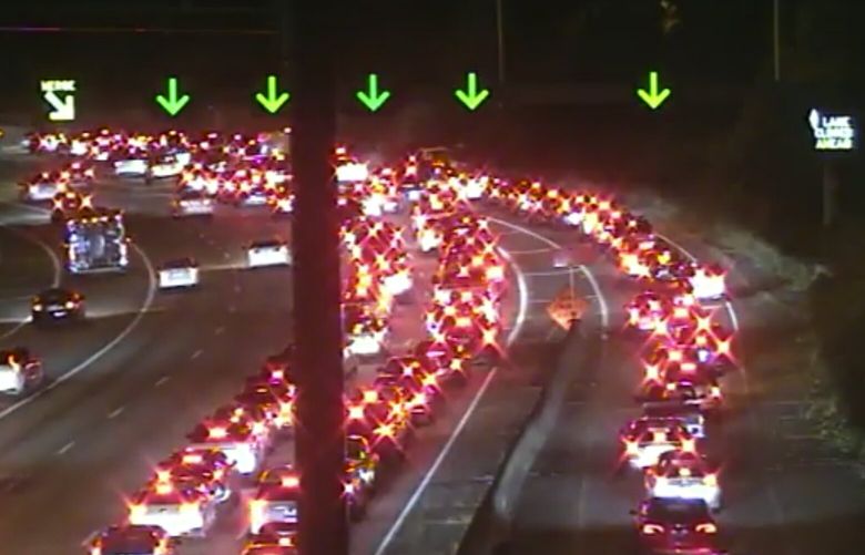 Westbound I-90 is gridlocked Friday, Sept. 23, 2022, as seen in this screen grab made from video.