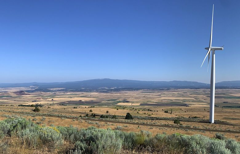 A wind turbine overlooks land where a proposed upper reservoir, taking up about 60 acres, would be built as part of the proposed Goldendale Energy Storage Project.