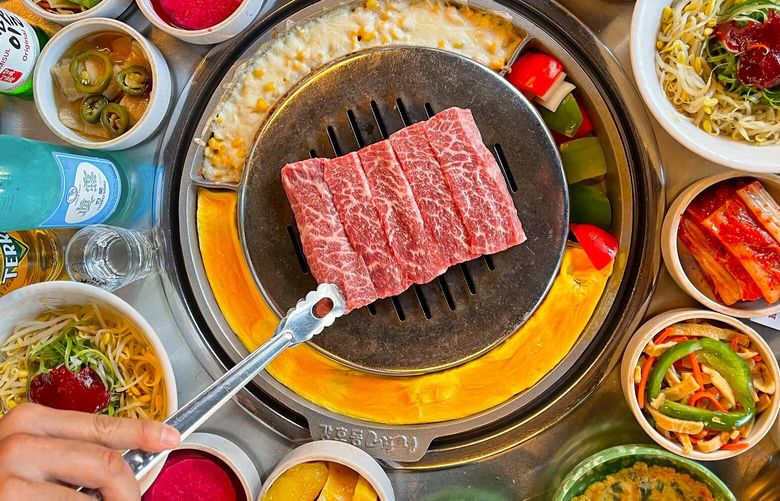 The short rib platter is one of the signature Korean barbecue dishes at Baekjeong in Lynnwood.