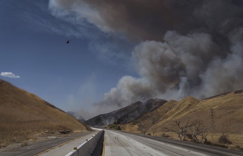 Interstate 5 shut down during the Route Fire in Castaic, Calif., on Aug. 31, 2022. MUST CREDIT: Bloomberg photo by Eric Thayer.