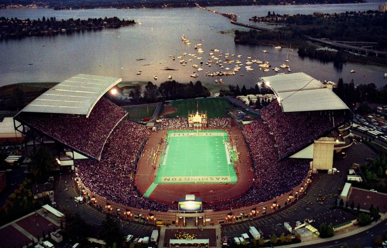 September 19, 1992 photo.  ORIGINAL CAPTION: You can’t tell from here, but the Washington Huskies are scoring their first points against Nebraska last night in a rare contest under the lights at Husky Stadium, recently rated by Sports Illustrated as the best place in the country to watch a college game. The No. 2-ranked Huskies beat No. 12 Nebraska before more than 73,000 fans.