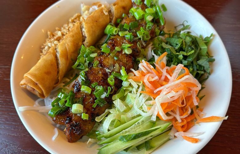 Topped with a lemongrass pork skewer and a crispy eggroll, the vermicelli noodle bun bowl at Pho 99 Authentic Vietnamese is not to be missed.