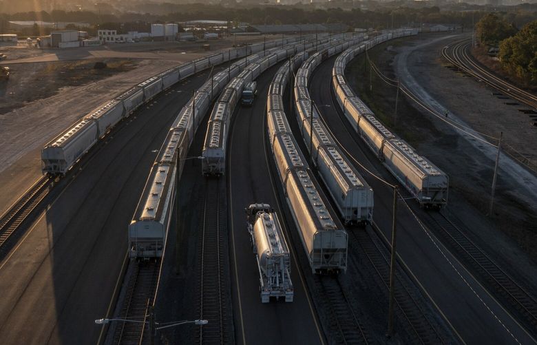 Freight train cars in Atlanta, Sept. 15, 2022. To defuse a labor dispute that brought the nation to the brink of a potentially catastrophic railroad strike, negotiators had to resolve a key issue: schedules that workers say were punishing, upending their personal lives and driving colleagues from the industry. (Dustin Chambers/The New York Times)
