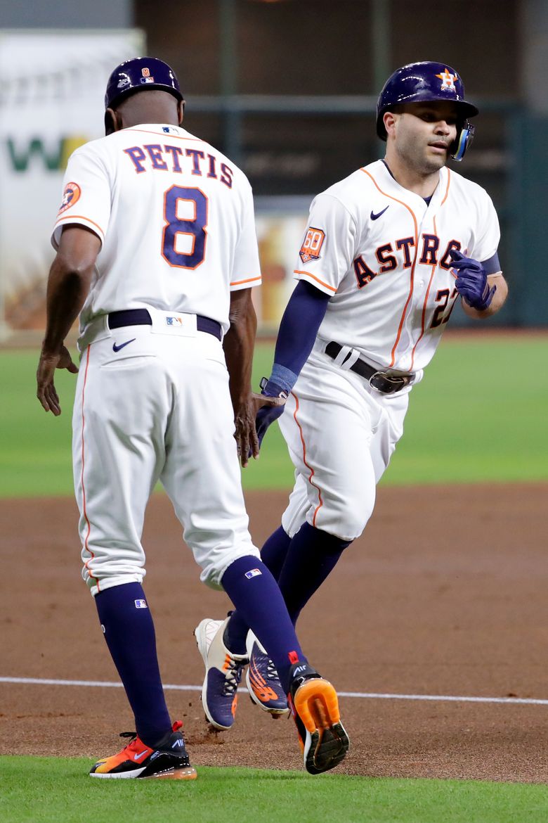 Altuve homers in big inning, Astros beat Angels