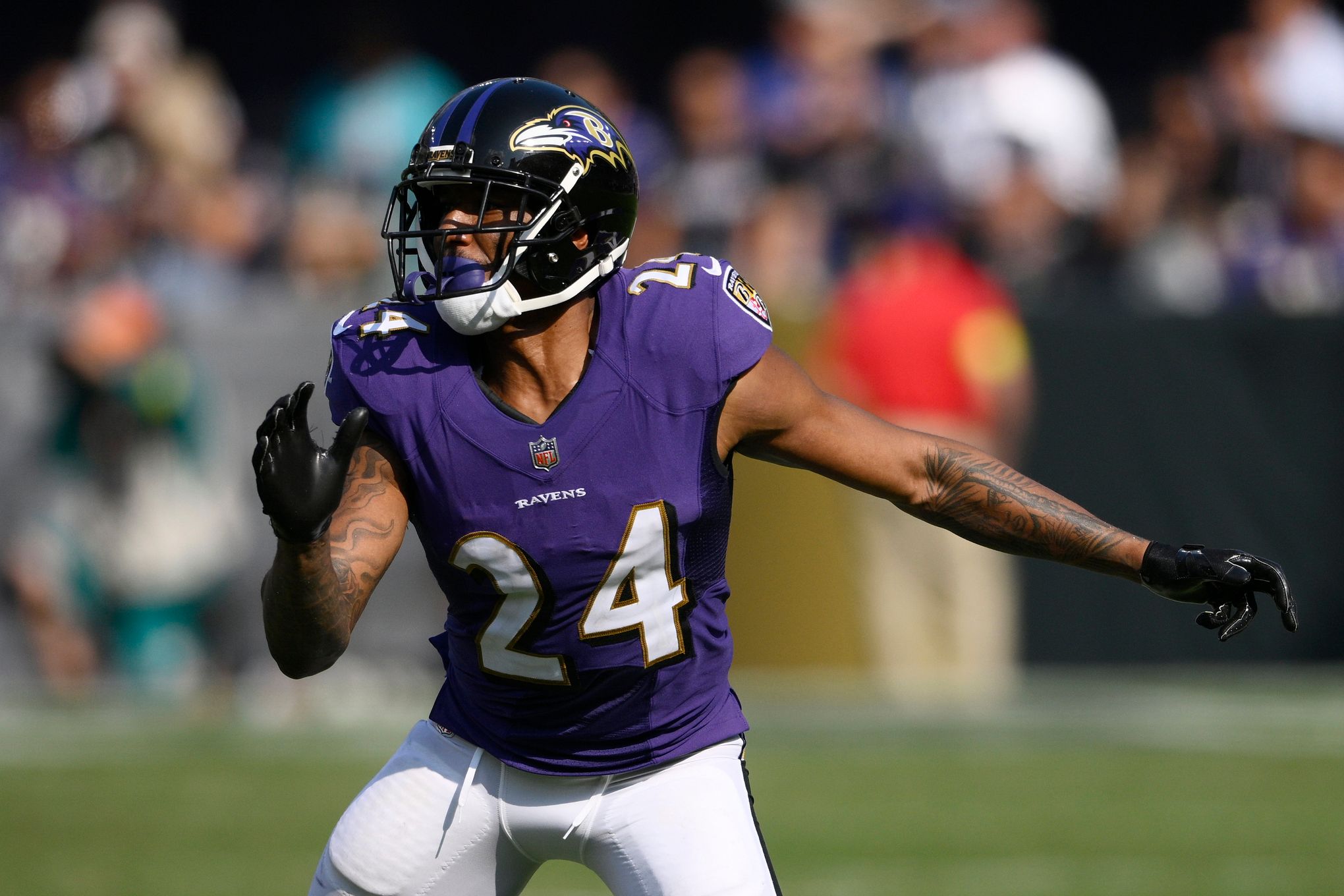 Baltimore Ravens cornerback Brandon Stephens (21) defends against