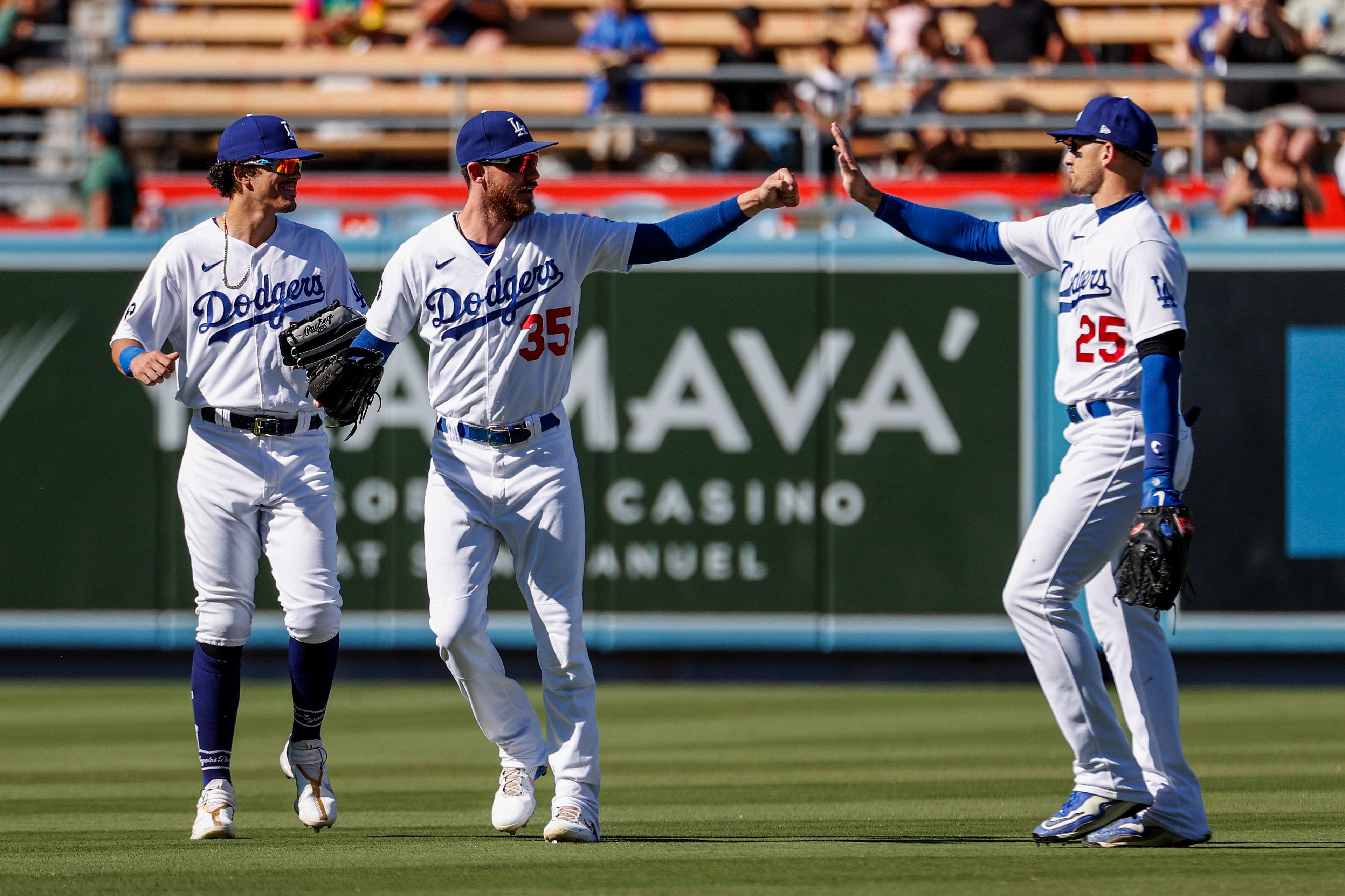 Rookie Vargas Dodgers rally past D backs 5th win in row The