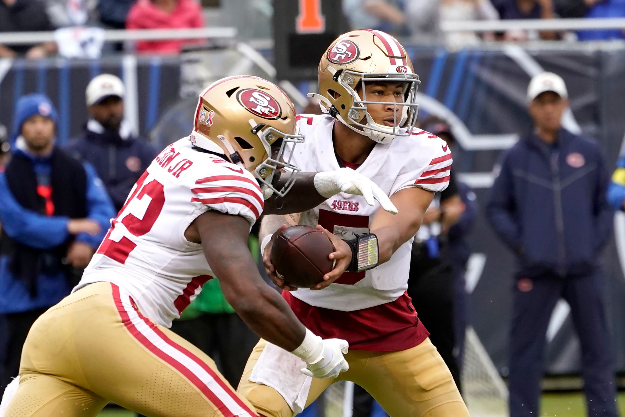 Jordan Mason of the San Francisco 49ers runs the ball during the