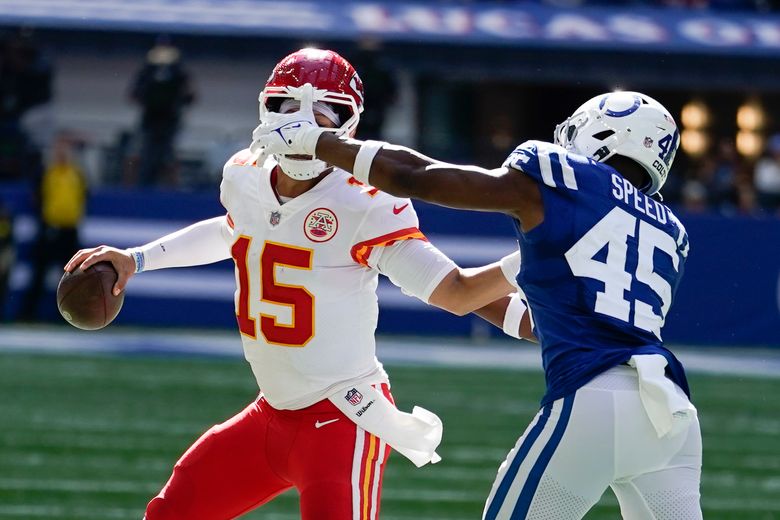 Kansas City Chiefs quarterback Patrick Mahomes (15) looks to make a pass  during the second half of the NFL Super Bowl 55 football game against the  Tampa Bay Buccaneers, Sunday, Feb. 7