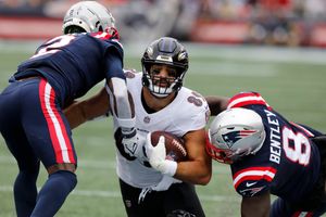 Ravens hold off Patriots 37-26