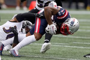 Ravens hold off Patriots 37-26