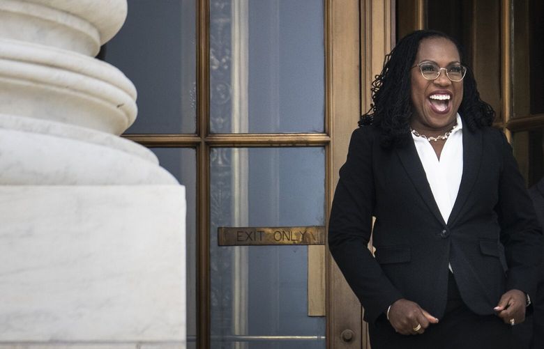 Justice Ketanji Brown Jackson stands outside the Supreme Court after her Investiture Ceremony in Washington on Friday, Sept. 30, 2022. Jackson, the first Black woman to serve on the Supreme Court, was welcomed by her colleagues on Friday at an investiture ceremony at the court that was attended by President Biden and Vice President Kamala Harris. (Erin Schaff/The New York Times) XNYT40 XNYT40