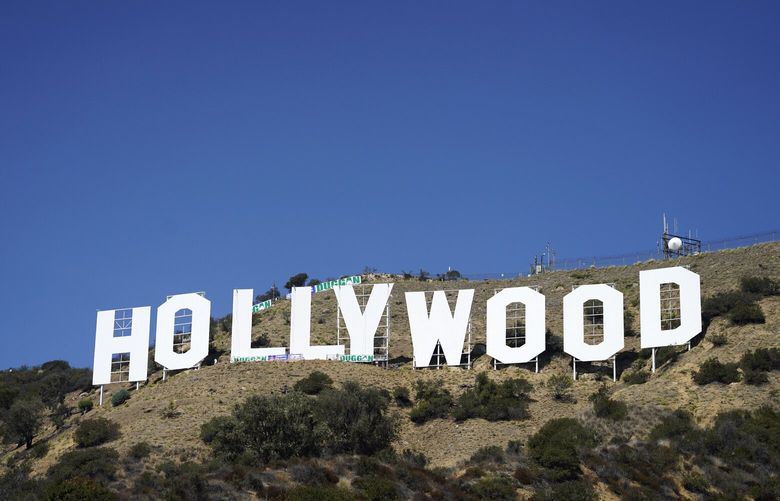 The Hollywood sign is pictured, Thursday, Sept. 29, 2022, in Los Angeles. The sign is getting a new paint job in preparation for its 100th anniversary in 2023. It was last painted in 2012. (AP Photo/Chris Pizzello) CACP109 CACP109