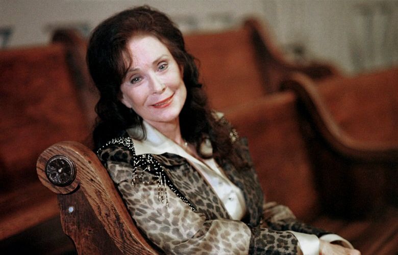 FILE – Country music great Loretta Lynn poses for a portrait in September 2000 in Nashville, Tenn. Lynn, the Kentucky coal minerâ€™s daughter who became a pillar of country music, died Tuesday at her home in Hurricane Mills, Tenn. She was 90. (AP Photo/Christoper Berkey, File)