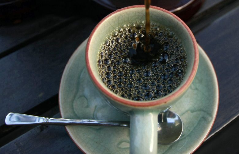 In this photo taken Dec. 3, 2012, the $1,100 per kilogram ($500 per pound) Black Ivory coffee is poured into a cup at a hotel restaurant in Chiang Rai province, northern Thailand. A Canadian entrepreneur with a background in civet coffee has teamed up with a herd of 20 elephants, gourmet roasters and one of the country’s top hotels to produce the Black Ivory, a new blend from the hills of northern Thailand and the excrement of elephants which ranks among the world’s most expensive cups of coffee. (AP Photo/Apichart Weerawong)