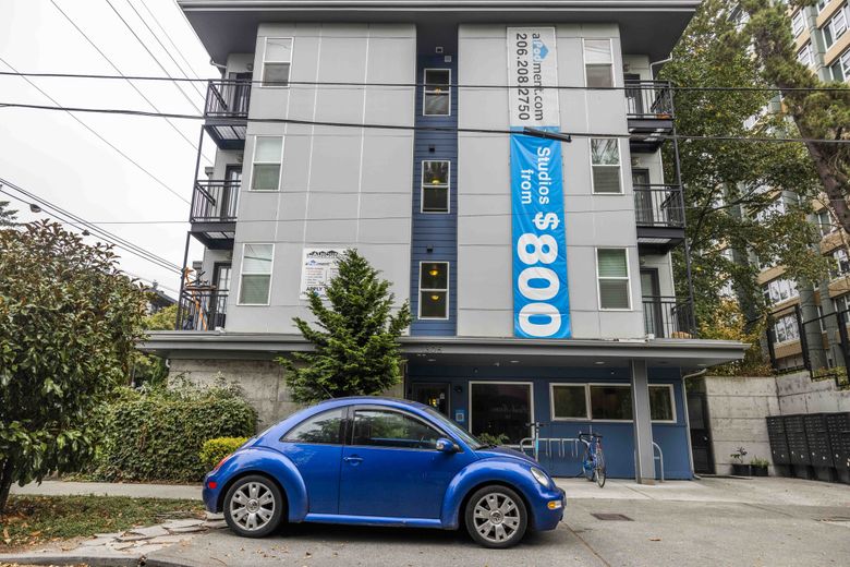 A micro-apartment building at 13th Avenue East and East Mercer Street on Wednesday. The developer of 23 micro-apartment buildings is selling all of the buildings. (Daniel Kim / The Seattle Times)