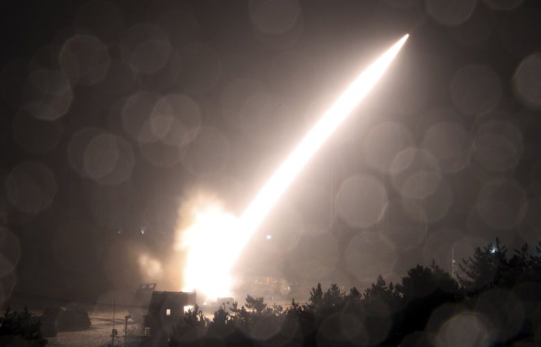 In this photo provided by South Korea Defense Ministry, an Army Tactical Missile System or ATACMS missile is fired during a joint military drill between U.S. and South Korea at an undisclosed location in South Korea, Wednesday, Oct. 5, 2022. The Joint Chiefs of Staff said the South Korean and U.S. militaries successfully fired a total of four Army Tactical Missile Systems missiles during the exercise that it said was aimed at demonstrating its precision strike capabilities against the North. (South Korea Defense Ministry via AP) XSEL103 XSEL103