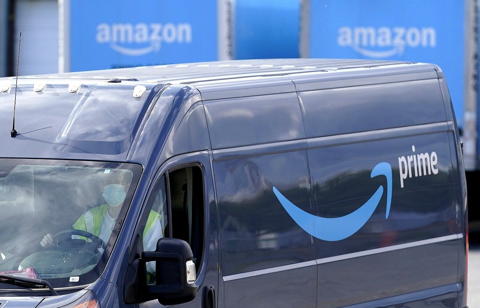 Amazon to invest $972 million in electric vans, trucks in