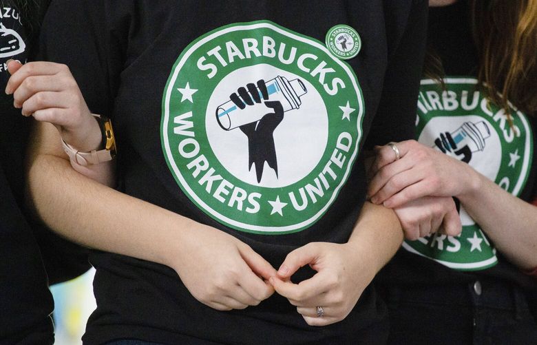 Starbucks employees and supporters react as votes are read during a union-election watch party on Thursday, Dec. 9, 2021, in Buffalo, N.Y.    (AP Photo/Joshua Bessex, File)