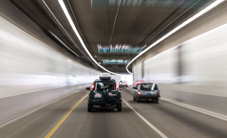 Drivers filled the tunnel just before tolls began Nov. 9, 2019, followed by pandemic-related building closures and quarantines the next March. (Steve Ringman / The Seattle Times)