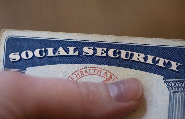 FILE – A Social Security card is displayed on Oct. 12, 2021 (AP Photo/Jenny Kane, File) 