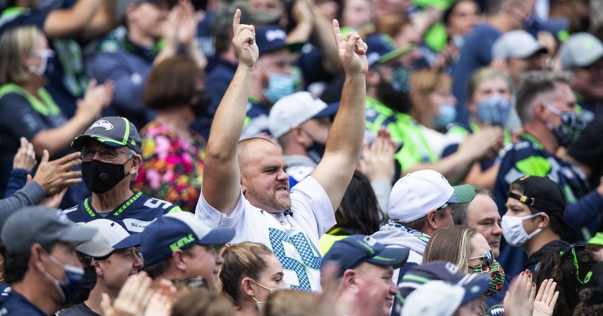 Silent in Seattle: Noisy Seahawks fans absent for opener - The San Diego  Union-Tribune