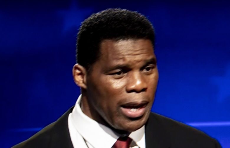 A monitor shows Herschel Walker, the Republican candidate, debating Sen. Raphael Warnock in Savannah, Ga. on Oct. 14, 2022. Republicans now want a fighter above all, even if the fighter is of questionable character and of loose allegiance to the truth. Aggression is attractive. You may be wrong, but if youâ€™re loud, it returns you to right, Charles Blow writes. (Kendrick Brinson/The New York Times) 

 XNYT153 XNYT153