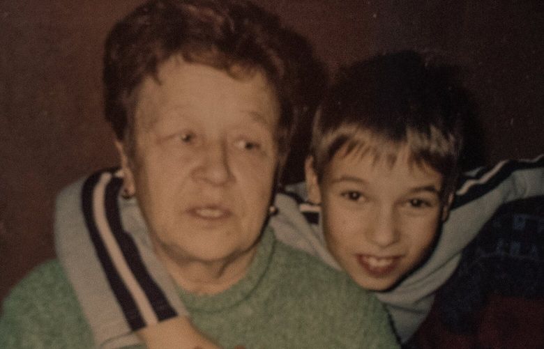 A family photo of Lyudmila Shchehlova, who was found hanging after the Russian occupation of Bucha, Ukraine, outside Kyiv, on Aug. 8, 2022. Her grandson Yevhen doubted that she would have been able to tie them on the high branches, but was resigned to his doubts. “I am a realist,” he said. “How is it possible to find out what happened if all the neighbors left, and she was alone at that moment?” (Laura Boushnak/The New York Times)