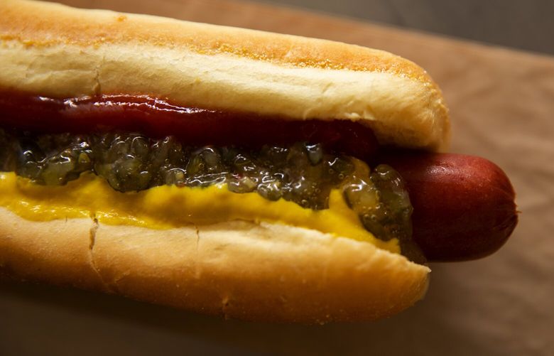 The $1.50 Costco quarter-pound hot dog deal (which includes a soda with refill), seen Thursday, July 14, 2022 at the SODO Seattle warehouse. This hot dog appears impervious to inflation since the 1980s.