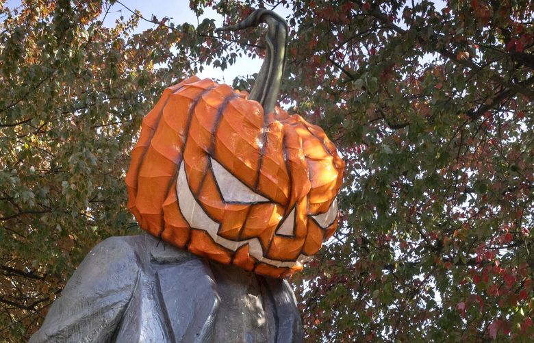The 16’ bronze statue of Russian Communist revolutionary Vladimir Lenin in Seattle’s Fremont neighborhood at the corner of N. 36th St. and Fremont Pl. N. Is all decked out for Halloween, shot Friday, October 14, 2022.
221888