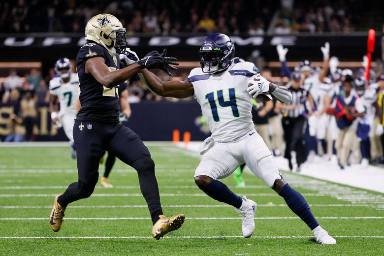 Seattle Seahawks wide receiver DK Metcalf (14) during an NFL football game  against the Denver Broncos, Monday, Sept. 12, 2022, in Seattle, WA. The  Seahawks defeated the Bears 17-16. (AP Photo/Ben VanHouten