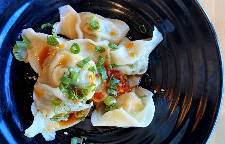 Shrimp and pork wontons served with a house spicy sauce.

Photographed Wednesday, Oct. 12, 2022, at Fan Tang Asian Cafe, 10615 NE 68th St. in Kirkland, Wash. 221967