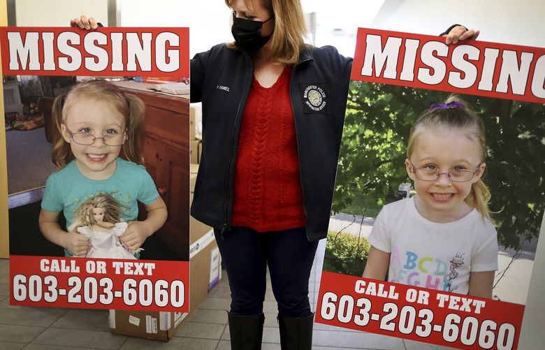 FILE â€” Manchester Police Public Information Officer Heather Hamel holds two missing posters, Tuesday, Jan. 4, 2022, in Manchester, N.H., that show missing girl Harmony Montgomery. Police say they have arrested the father of a New Hampshire girl who disappeared at age 5 in 2019 but was not reported missing until late last year. Authorities said Monday, Oct. 24, 2022 that Adam Montgomery will be arraigned Tuesday on charges including second-degree murder and abuse of a corpse. (John Tlumacki/The Boston Globe via AP, File)/The Boston Globe via AP) MABOD201 MABOD201