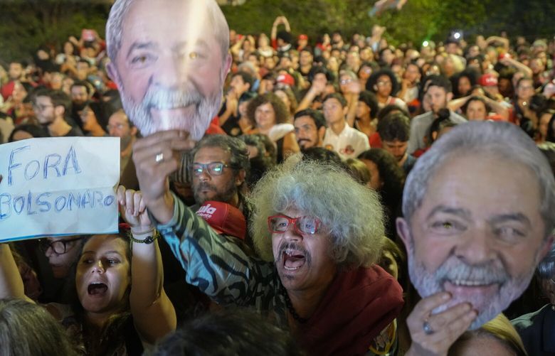 Supporters of Brazil’s former President Luiz Inacio Lula da Silva, who is running for reelection, cheer during a campaign rally “in defense of democracy” at the Pontiff Catholic University in Sao Paulo, Brazil, Monday, Oct. 24, 2022. Da Silva will face Brazilian President Jair Bolsonaro in a presidential runoff on Oct. 30. (AP Photo/Andre Penner) OTKXAP112 OTKXAP112