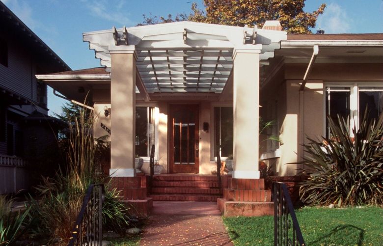 This stucco California bungalow designed by Ellsworth Storey is part of the 2022 Mount Baker Home Tour, as it was in 1995.