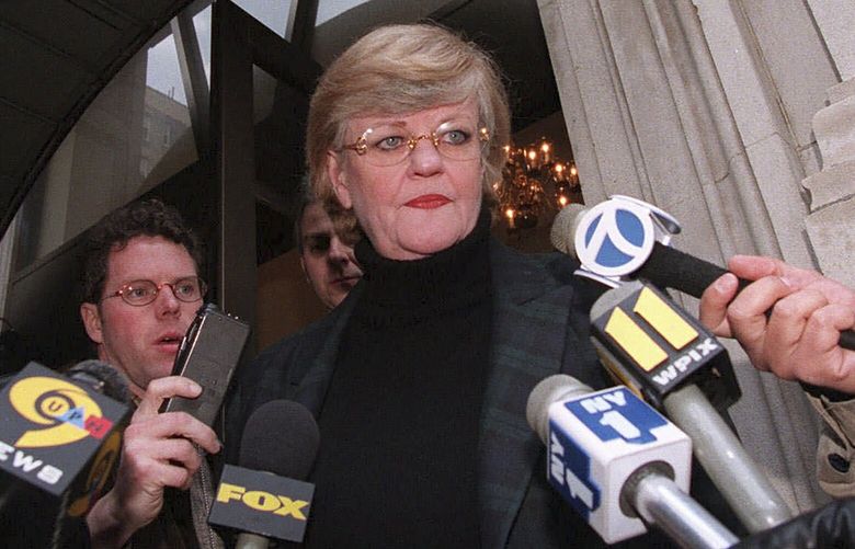 FILE – New York literary agent Lucianne Goldberg addresses a large assembly of media outside her apartment Saturday, Jan. 24, 1998, in New York. Goldberg, a key figure in the 1998 impeachment of President Bill Clinton over his affair with Monica Lewinsky, has died, Wednesday, Oct. 26, 2022 at the age of 87. (AP Photo/Emile Wamsteker, File) NYJJ101 NYJJ101