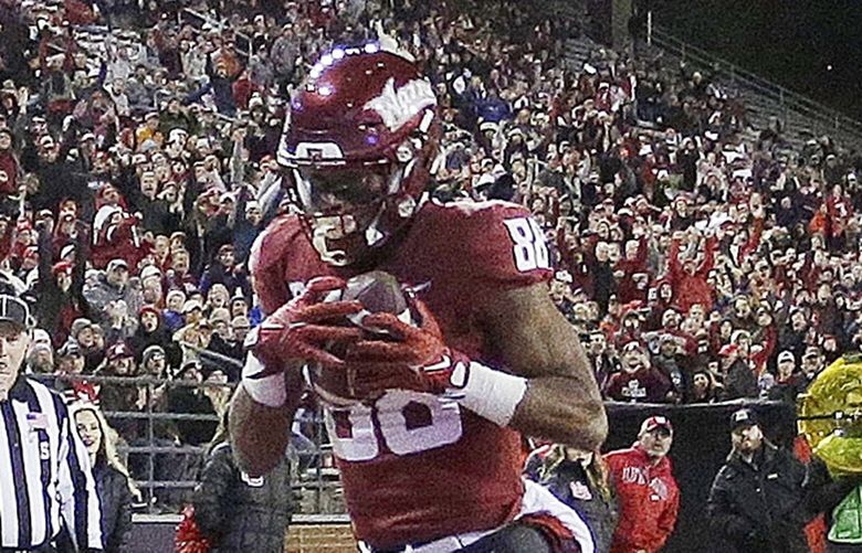 Washington State wide receiver De’Zhaun Stribling (88) scores a touchdown during the first half of an NCAA college football game against Utah, Thursday, Oct. 27, 2022, in Pullman, Wash. (AP Photo/Young Kwak) WAYK103 WAYK103