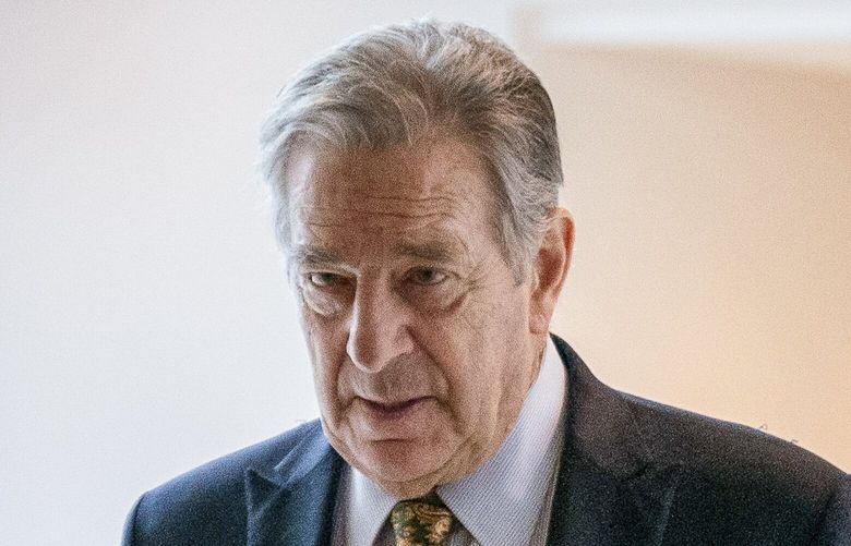 FILE – Paul Pelosi, right, the husband of House Speaker Nancy Pelosi, of California, follows his wife as she arrives for her weekly news conference on Capitol Hill in Washington on March 17, 2022. (AP Photo/Andrew Harnik, File) WX101 WX101