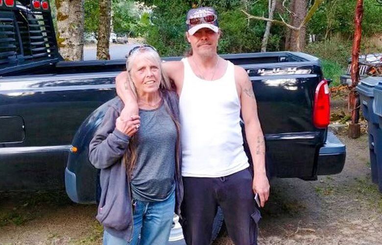 Lynda Marsh (left) and her son Joshua Marsh (right) in Ocean Shores in 2020. Marsh has been detained for 6 months before receiving court-ordered restoration treatment at Western State Hospital. Wait times have become so long, that defendants sometimes take weeks or months past their mandated timeframes.