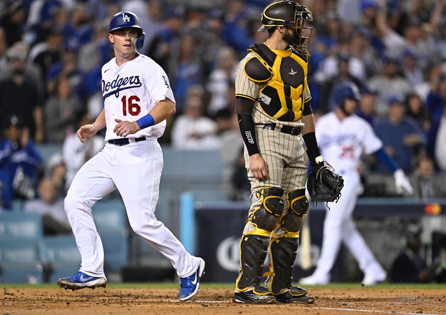 San Diego Padres third basemen Manny Machado (13) ties his shoes