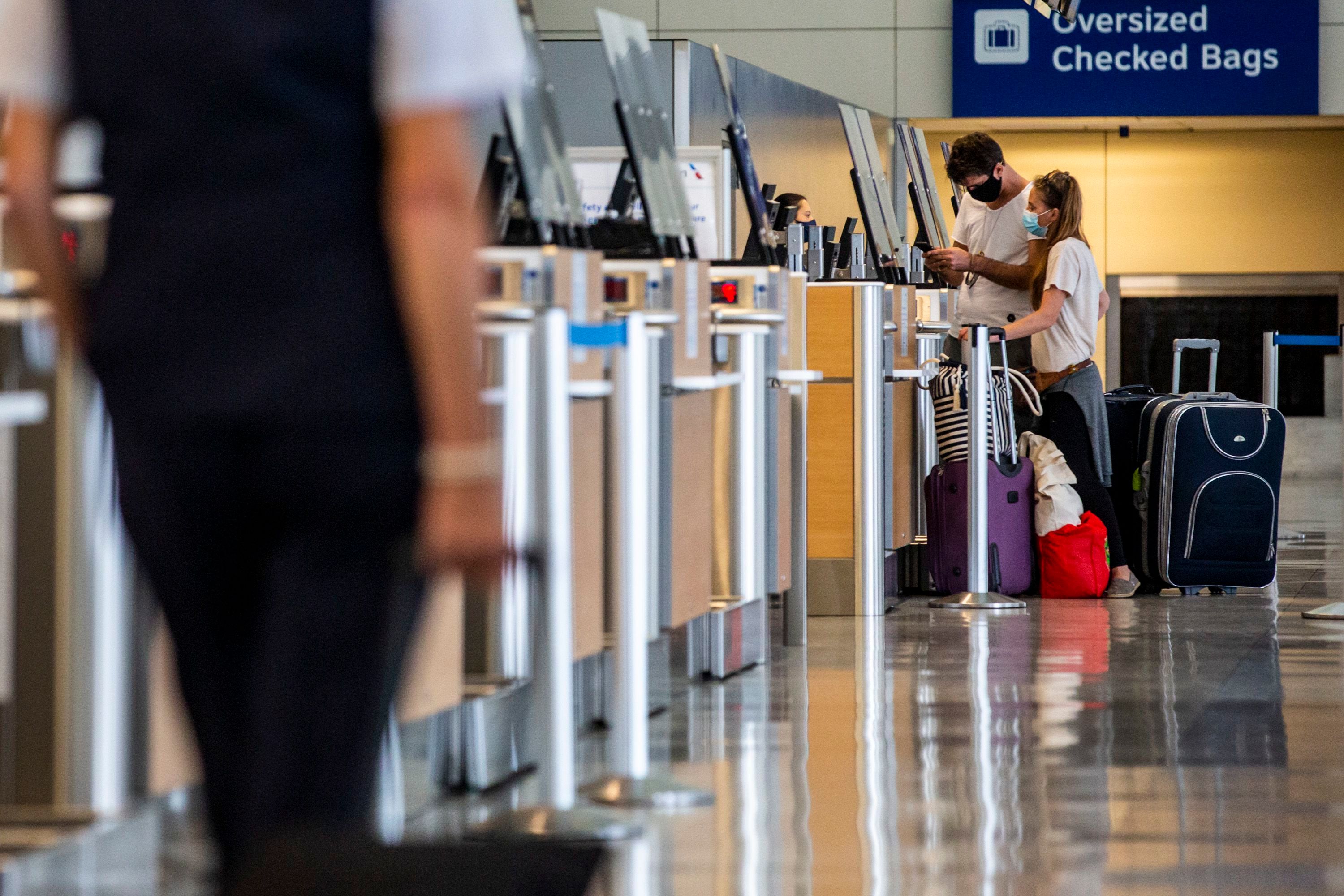 How to get free checked bags on American Airlines  findercom