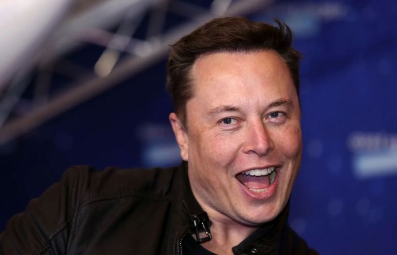 Elon Musk, founder of SpaceX and chief executive officer of Tesla, arrives at the Axel Springer Award ceremony in Berlin, Germany, on Dec. 1, 2020. The world’s richest man has a history of launching products based on jokes. The latest collectible is a perfume with “the essence of repugnant desire.” (Bloomberg)