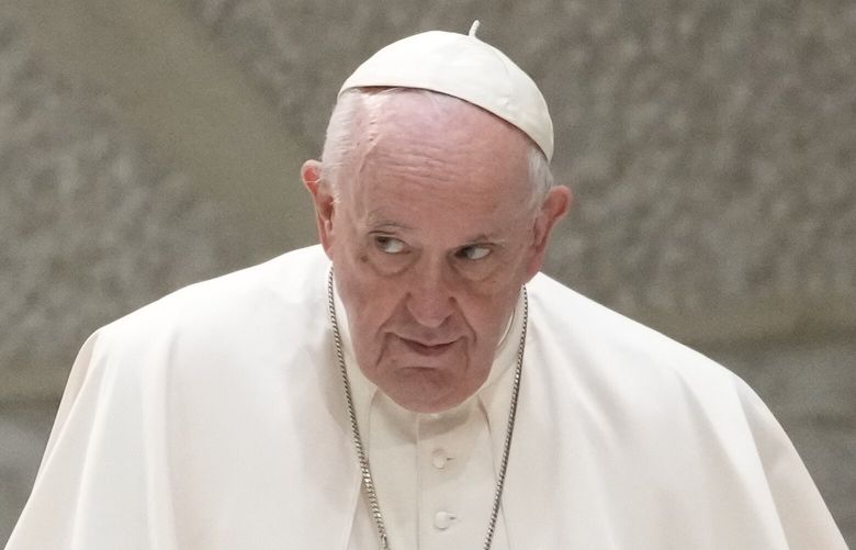 Pope Francis arrives for an audience with members of the International Christian Union of Business Executives, in the Pope Paul VI hall at the Vatican, Friday, Oct. 21, 2022. (AP Photo/Andrew Medichini) AJM104 AJM104