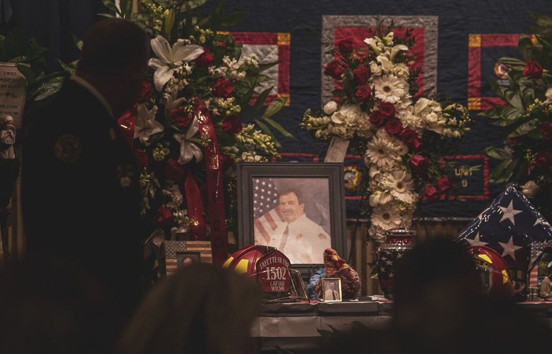 Capt. Julian Greaves Wilson Jr. died of covid-19 in January. His work as a paramedic is evident in tributes at a funeral home in Somerville, Tenn. MUST CREDIT: Photo for The Washington Post by Andrea Morales