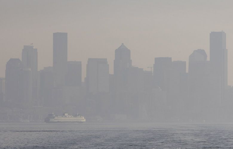 A Washington State Ferry can be seen heading towards Colman dock in downtown Seattle through hazy skies that are obscuring the Seattle skyline Monday, October 10, 2922.  The smoke is partially caused by the Bolt Creek Fire, which continues to burn in rugged terrain.  The fire is expected to have limited growth and crews are still working to put it out.  US 2 Is currently open throughout the fire area.  No additional planned closures are scheduled.  

Two wildfires continue to burn east of the Cascade Crest and are contributing to smoke in the area.

For more information on air quality, go to Washington Smoke Blog at: https://wasmoke.blogspot.com/ 221805