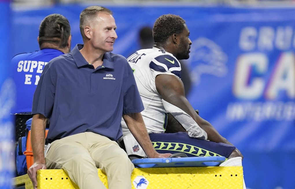 Metcalf carted to locker room with knee injury, X-rays negative