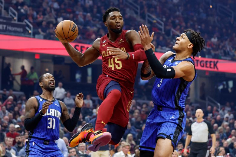 https://images.seattletimes.com/wp-content/uploads/2022/10/urn-publicid-ap-org-0ea7dbb7d85e072d60d7047e8ceb97c3Magic_Cavaliers_Basketball_68532.jpg?d=780x520