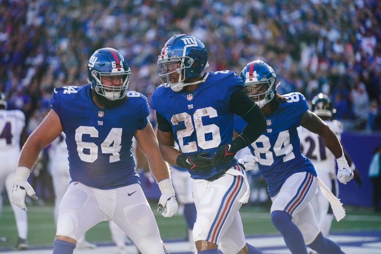 New York Giants running back Saquon Barkley (26) celebrates after