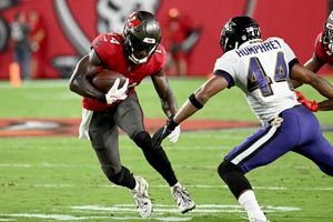 Jackson shines, Ravens beat Brady, struggling Bucs 27-22 - WTOP News