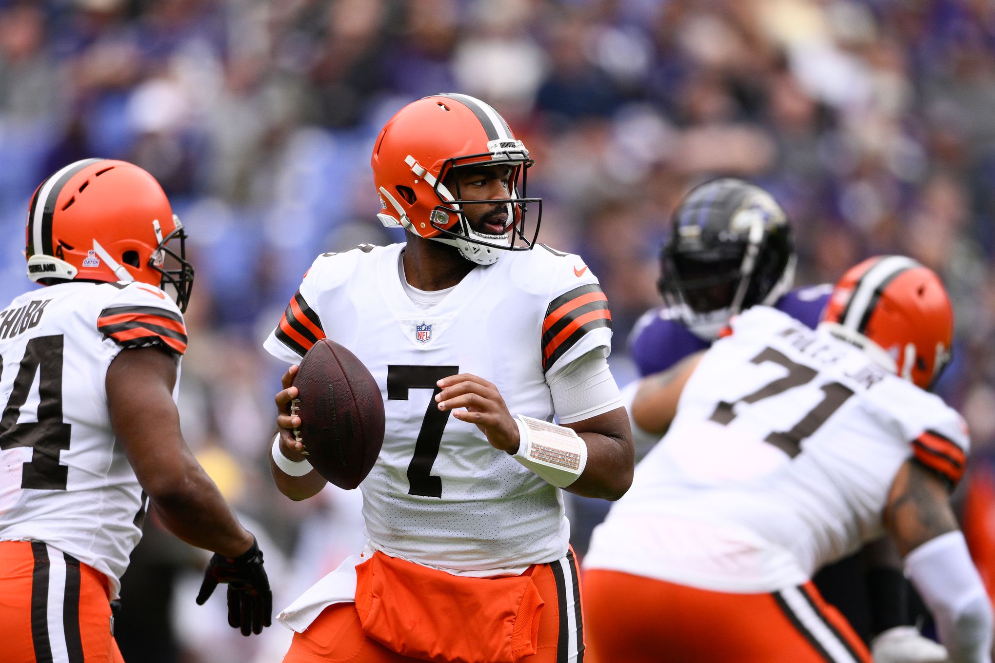 Cleveland Browns quarterback Jacoby Brissett (7) listens to a